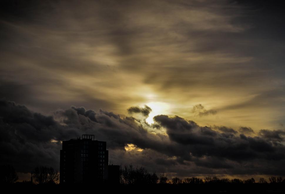 Free Image of Building Under Cloudy Sky 