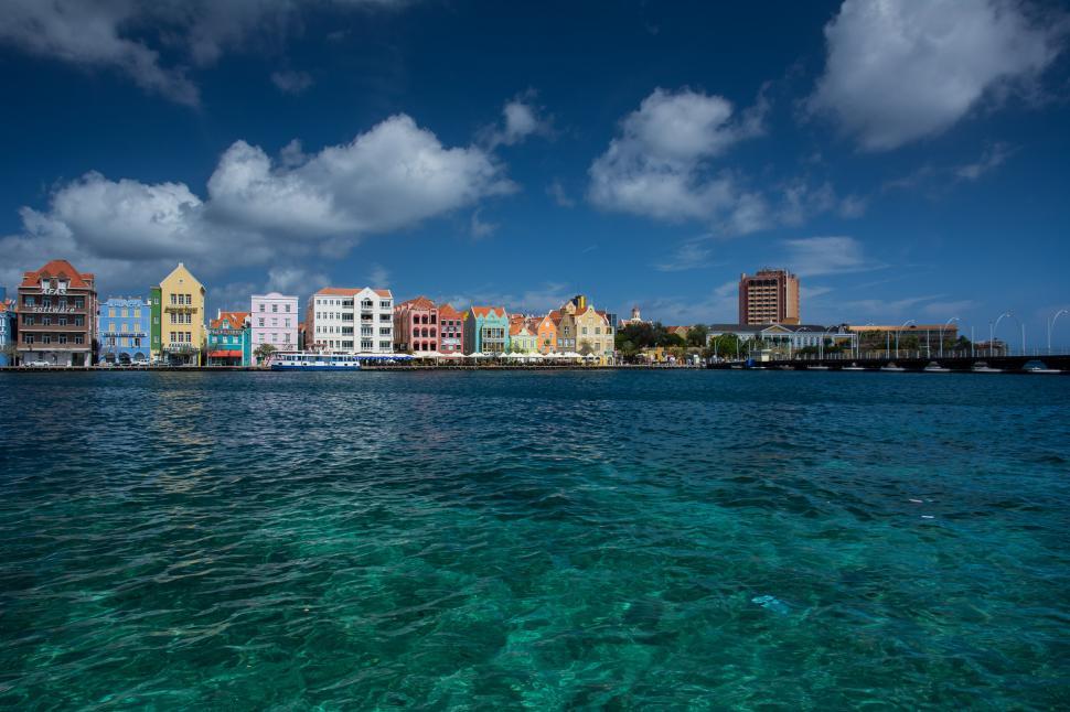 Free Image of Waterfront Buildings Overlooking Body of Water 