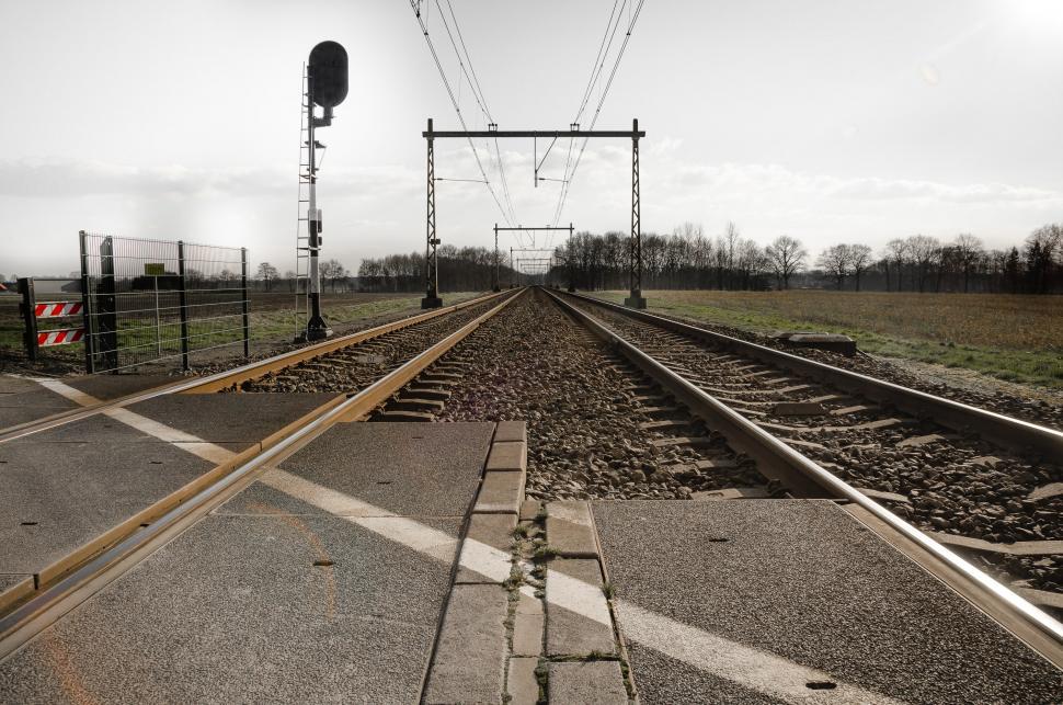 Free Image of Black and White Photo of a Train Track 