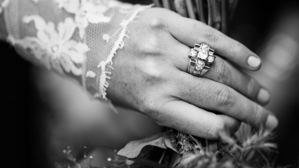 Free Image of Close Up of Person Wearing Wedding Ring 