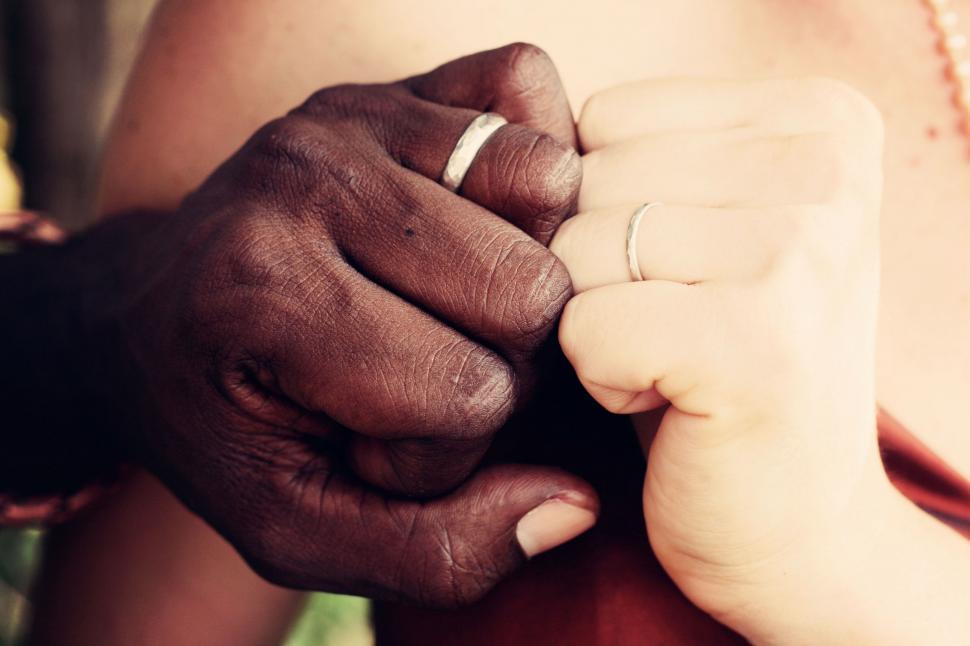 Free Image of Person Holding Ring Closely 