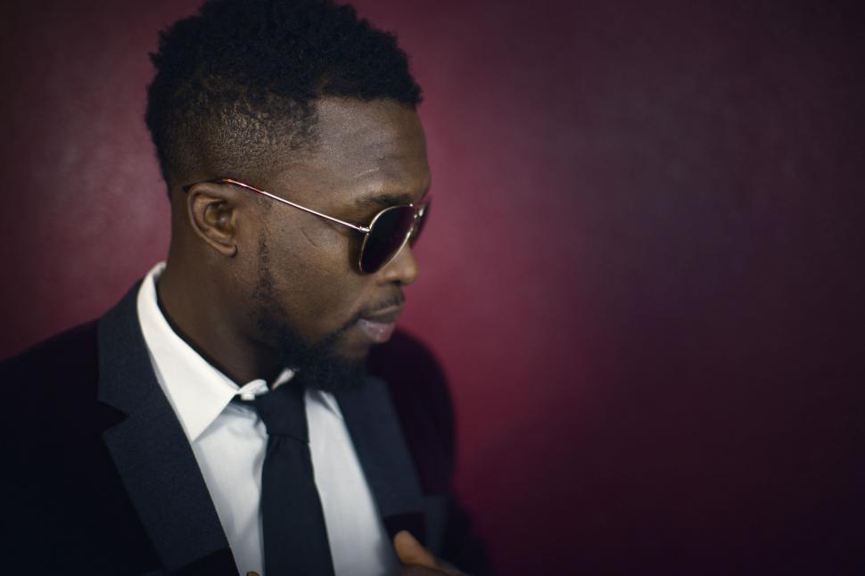 Free Image of Stylish Man in Suit and Tie Wearing Sunglasses 