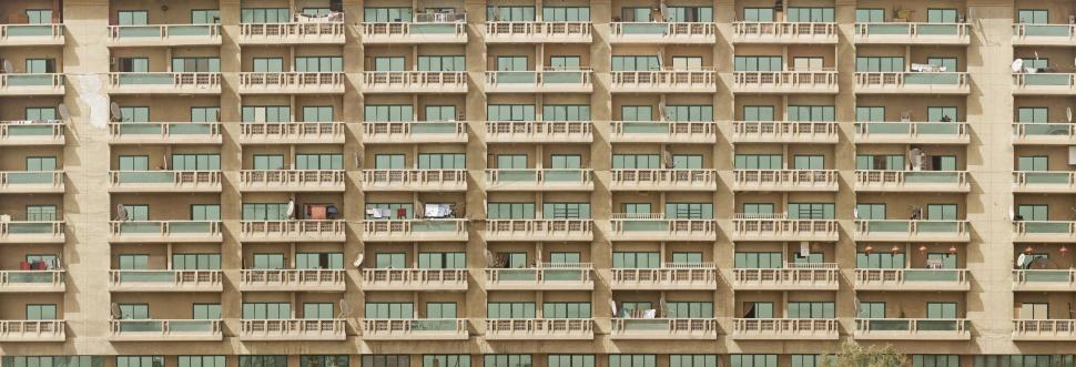 Free Image of Tall Building With Balconies and Side Balconies 