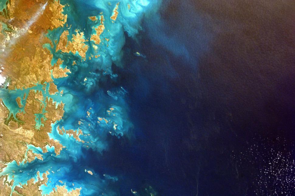 Free Image of Large Body of Water Surrounded by Land 