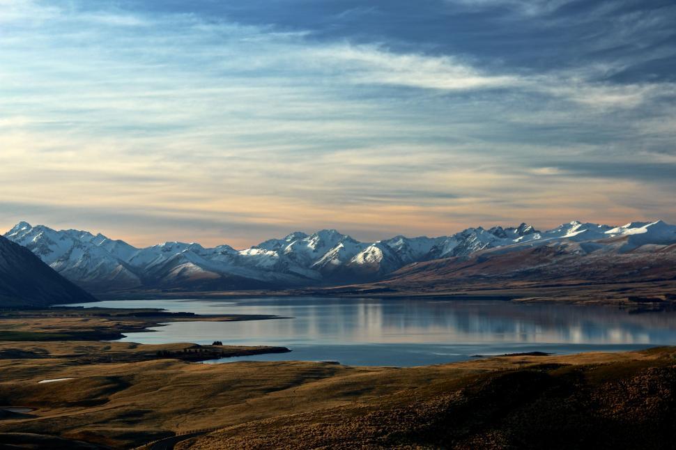 Free Image of Majestic Water Body Surrounded by Towering Mountains 