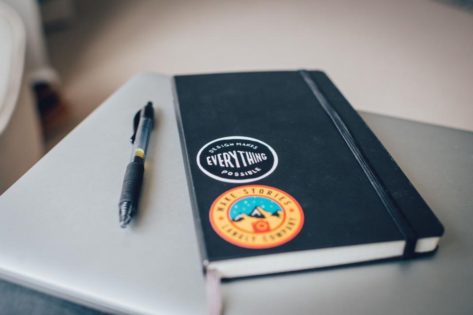 Free Image of Notebook With Pen 