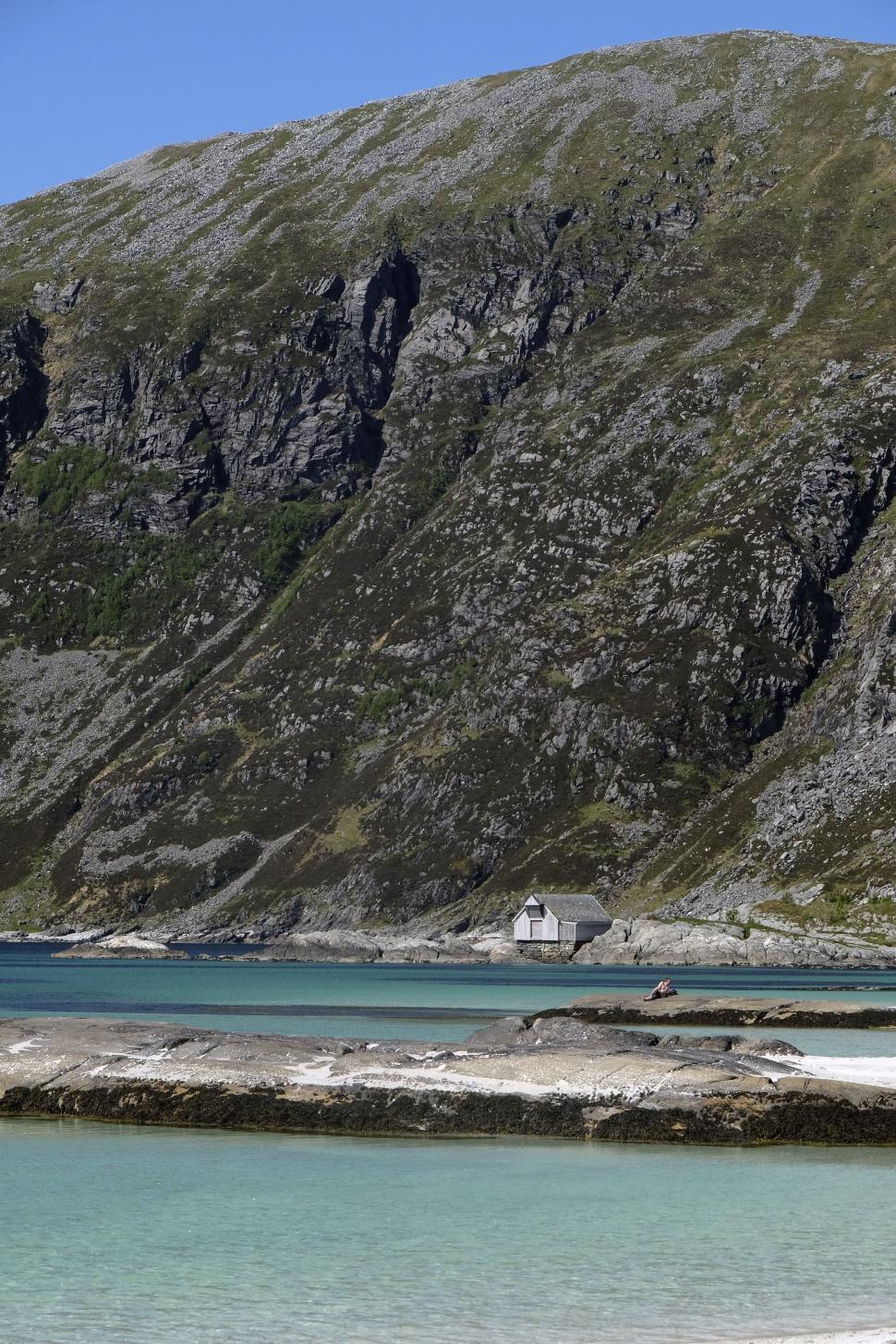 Free Image of Majestic Mountain Overlooking Body of Water 