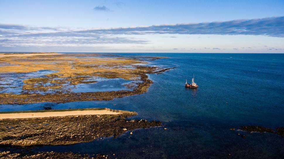 Free Image of Aerial View of Boat in Water 