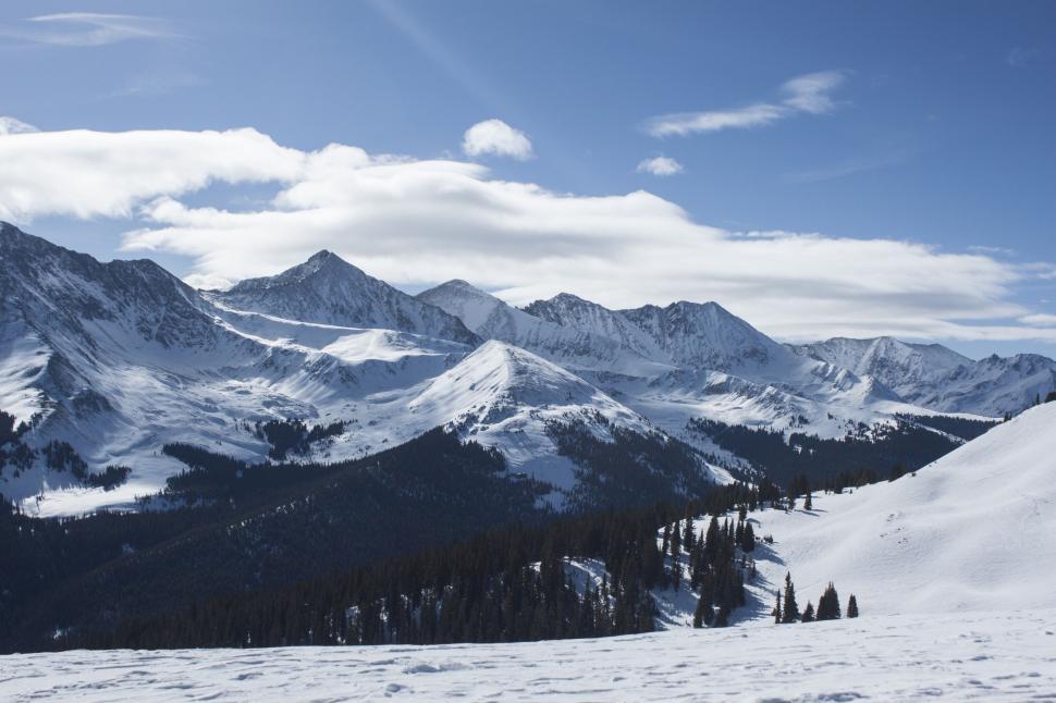Free Image of Person Snowboarding in the Snow 