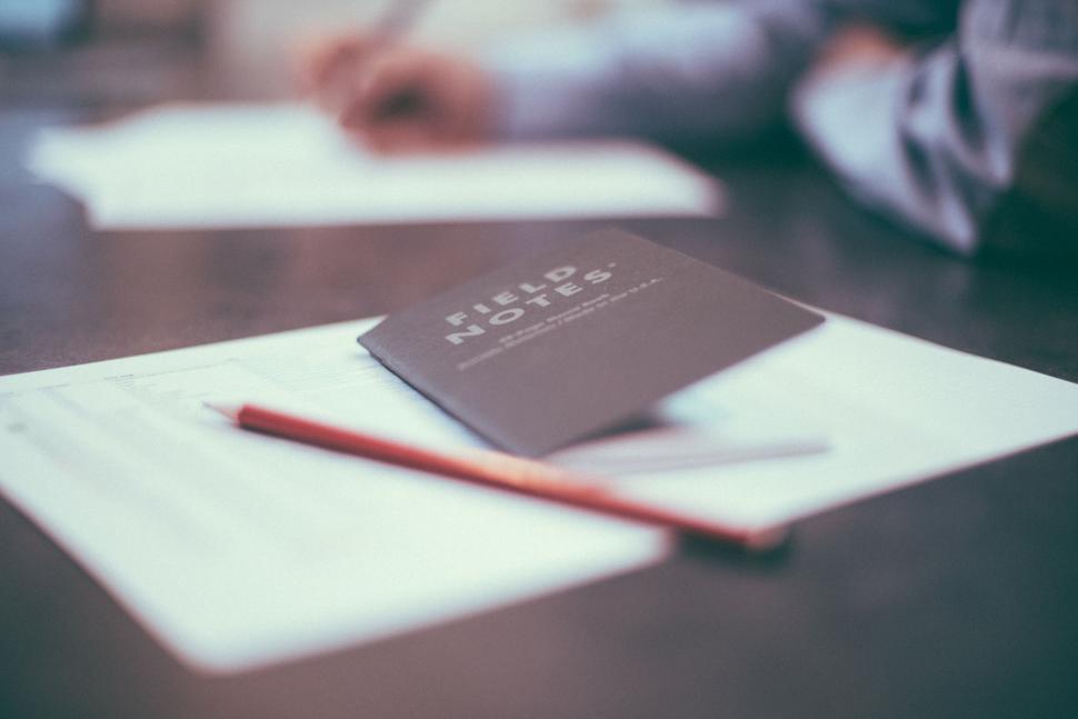 Free Image of Book and Pen on Table 