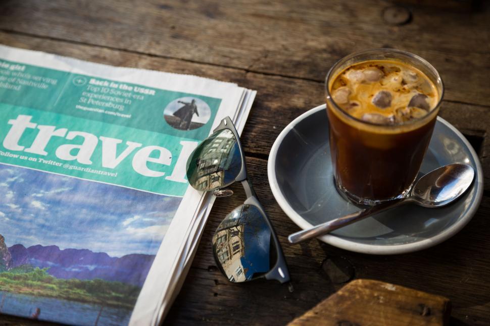 Free Image of A Cup of Coffee on Wooden Table 