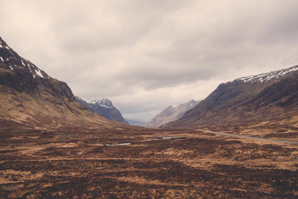 Free Image of Majestic Mountains Overlooking Valley 