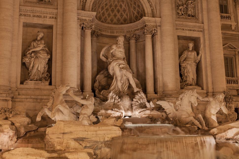 Free Image of Fountain in Front of Building With Statues 