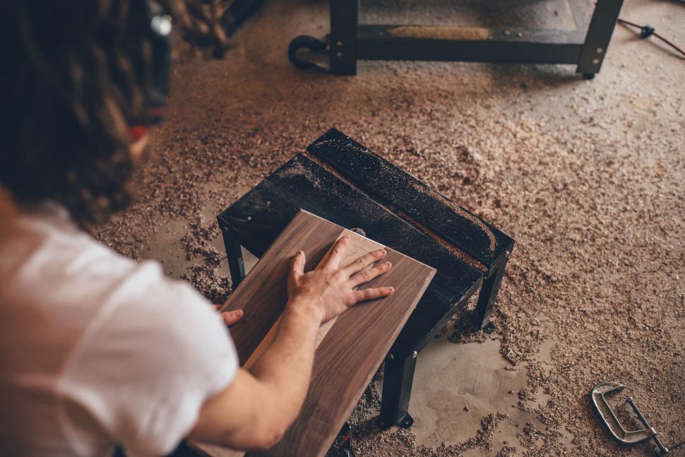 Free Image of Person Carving Wood 