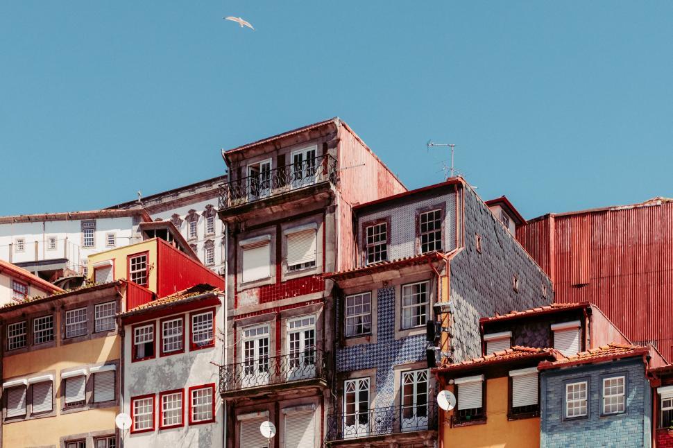 Free Image of Group of Buildings With Windows and Balconies 