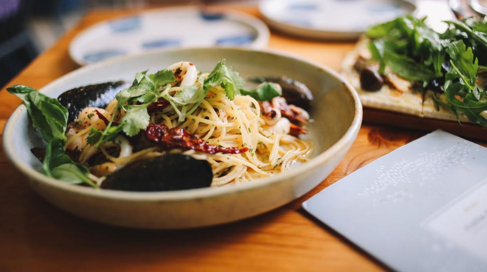 Free Image of Bowl of Food on Wooden Table 
