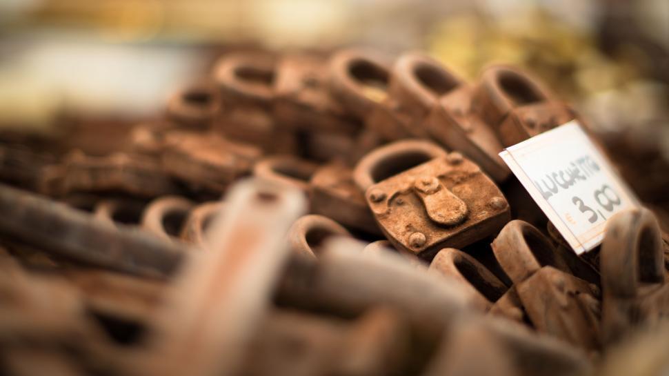 Free Image of A Close Up of a Pile of Brown Shoes 