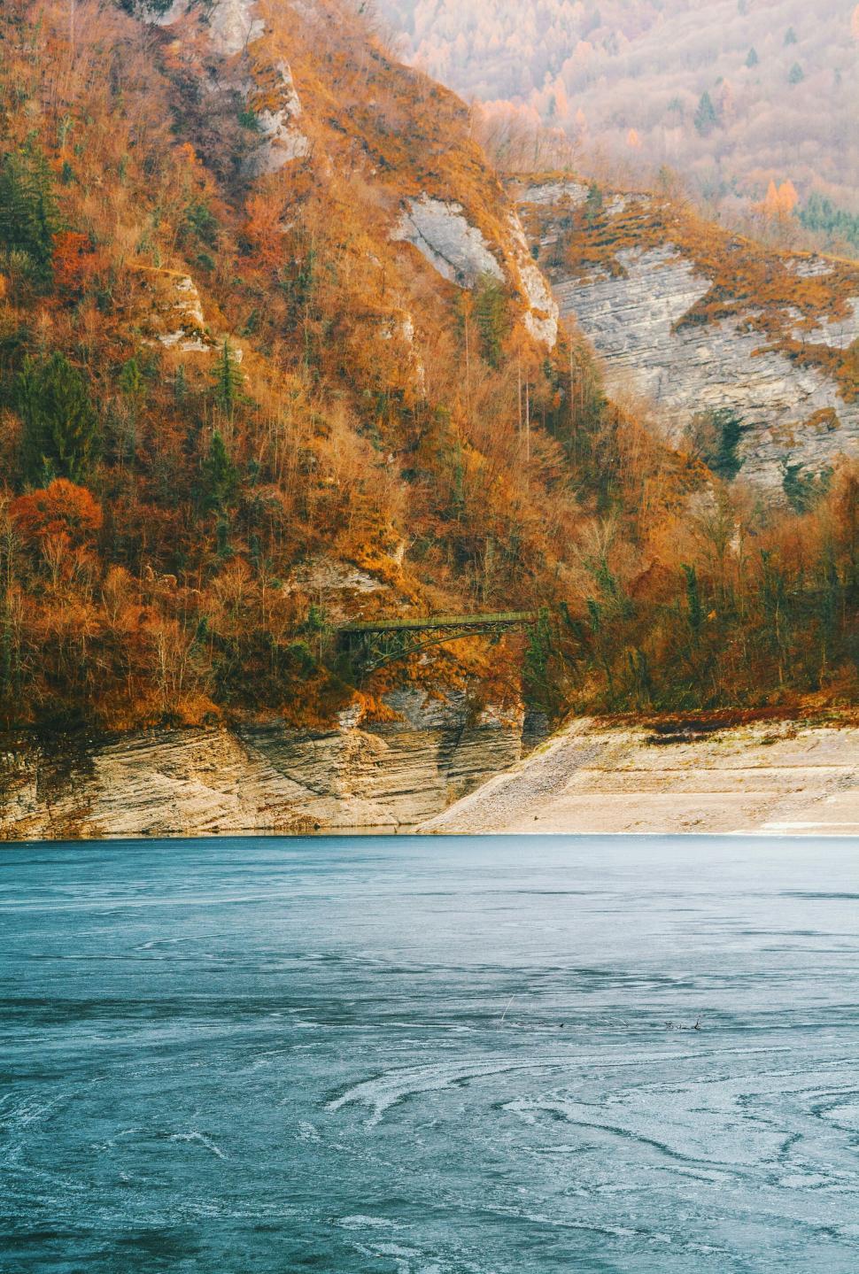 Free Image of Mountain Overlooking Body of Water 