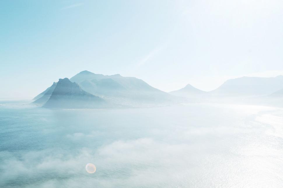 Free Image of Majestic Mountain Peaks in Blue Sky 