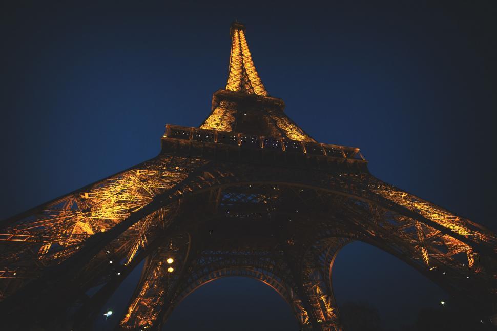 Free Image of The Eiffel Tower Illuminated at Night 
