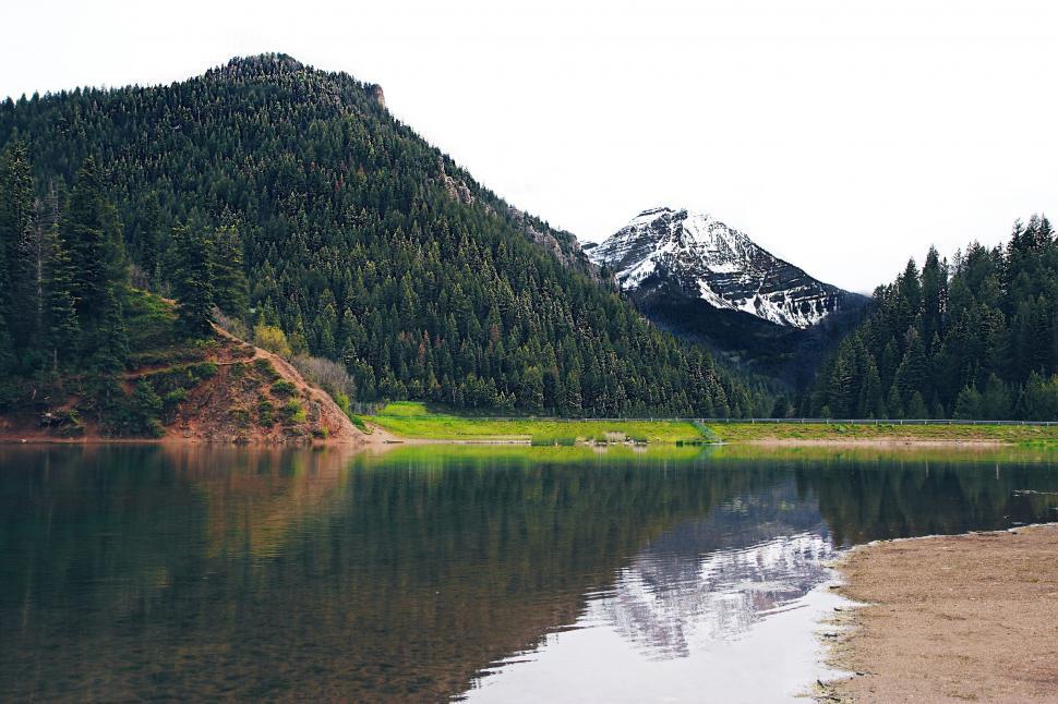 Free Image of Mountain Overlooking Body of Water 
