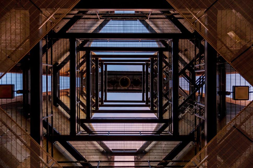 Free Image of Massive Metal Structure With Abundant Windows 