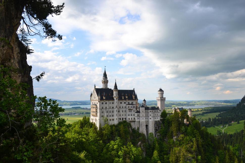 Free Image of Majestic Castle on Lush Green Hillside 