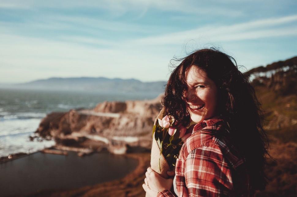 Free Image of Man With Long Hair and Plaid Shirt 