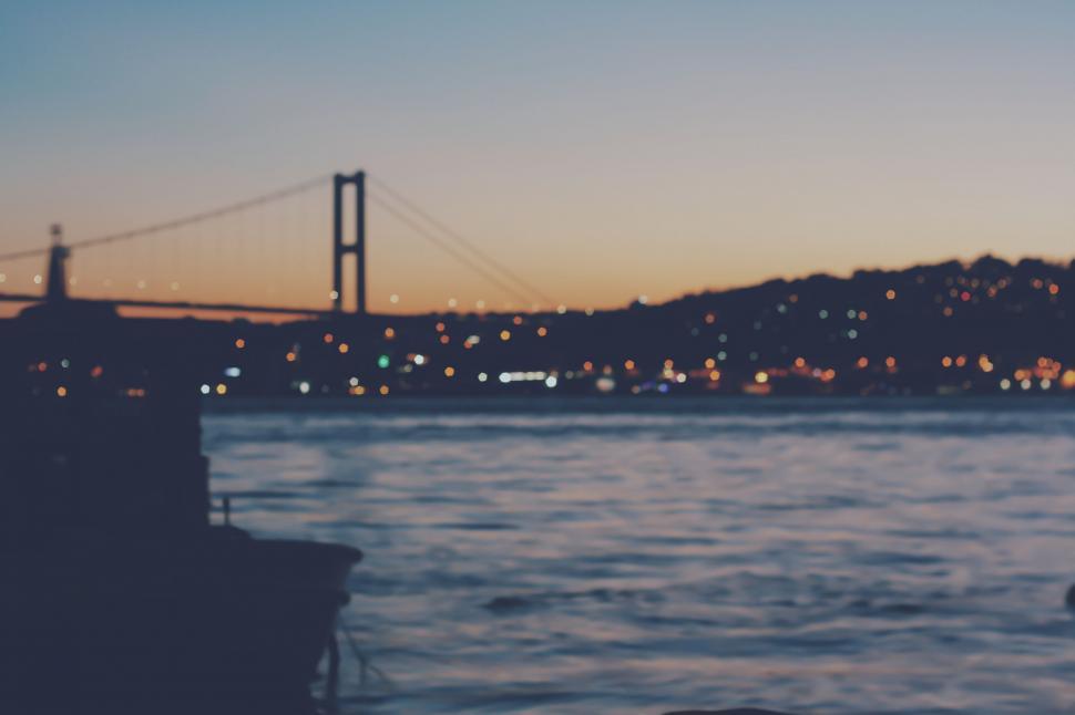 Free Image of Boat Sailing Towards Bridge 