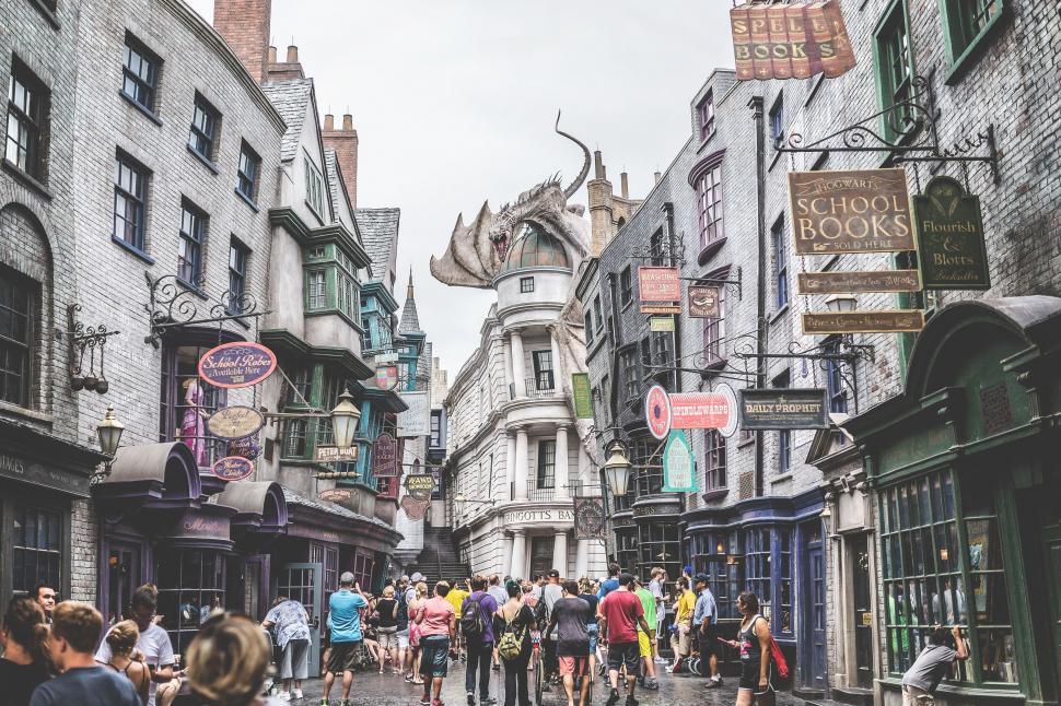Free Image of Group of People Walking Down a City Street 