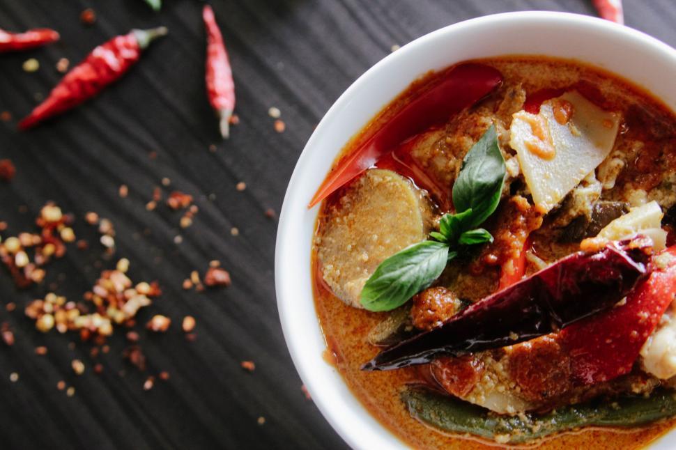 Free Image of White Bowl Filled With Food on Table 