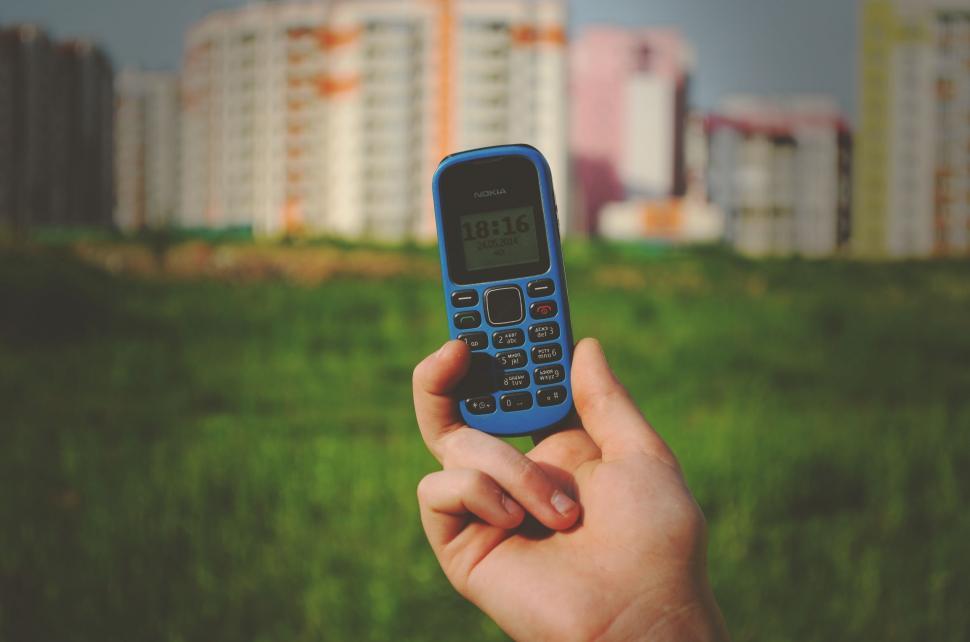 Free Image of Person Holding Cell Phone in Hand 