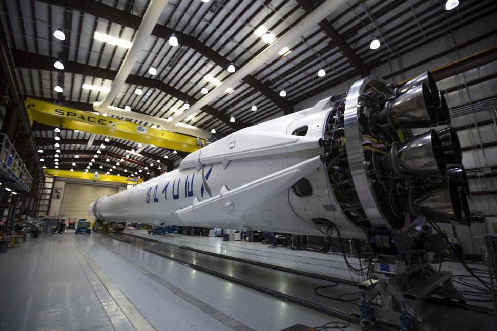 Free Image of Large White Jet Inside Hangar 
