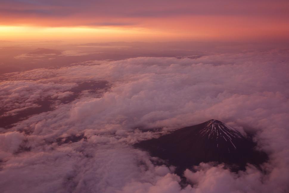 Free Image of Clouds Enveloped Mountain Peak 