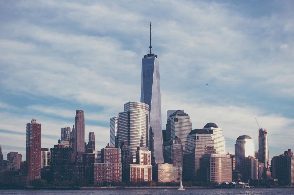 Free Image of Urban Cityscape Across Vast Waterway 