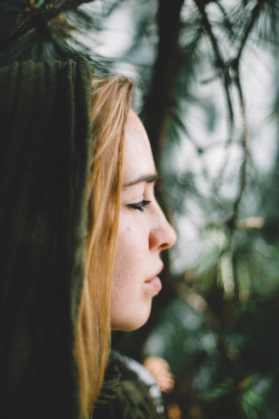 Free Image of Woman With Red Hair Looking Away 