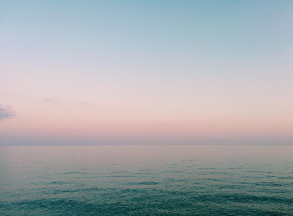Free Image of Vast Body of Water Beneath Blue Sky 