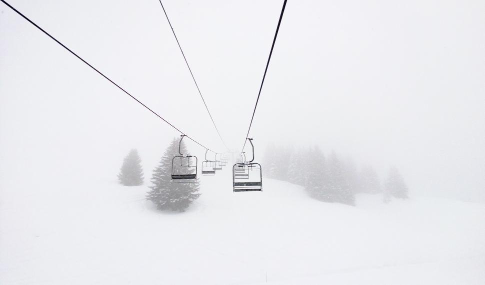Free Image of Ski Lift Ascending Snowy Mountain 