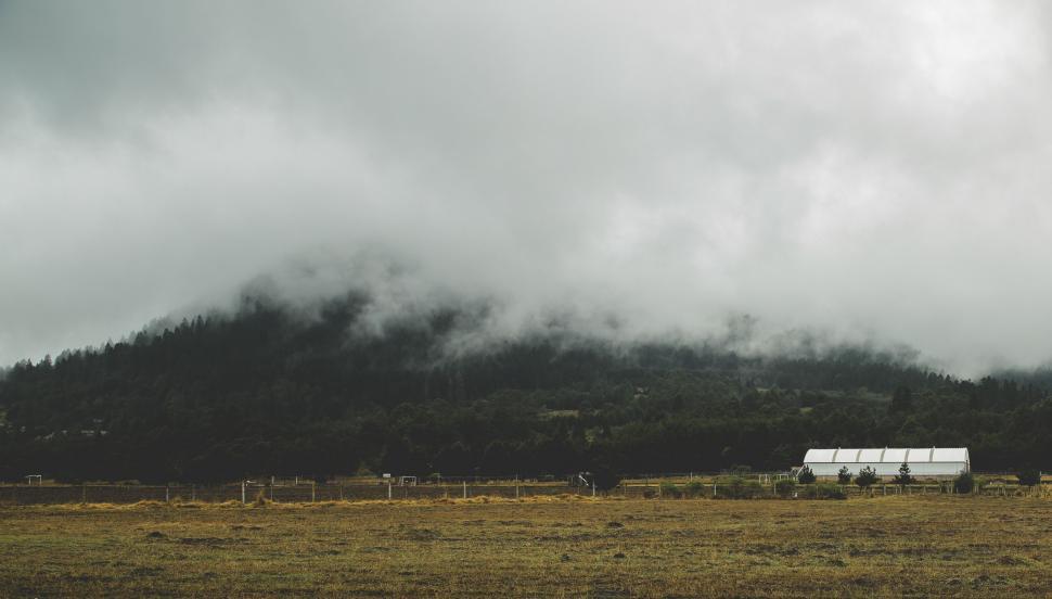 Free Image of House in the Middle of a Large Field 