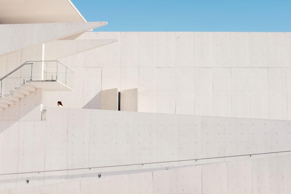 Free Image of Man Riding Skateboard Down Cement Wall 