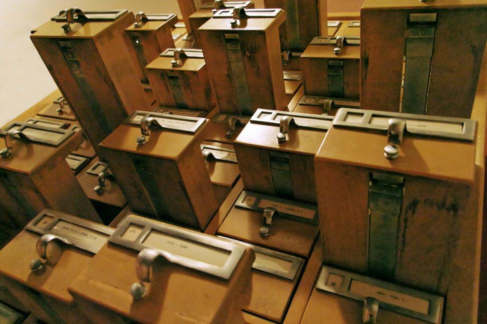 Free Image of Room Filled With Wooden Drawers 