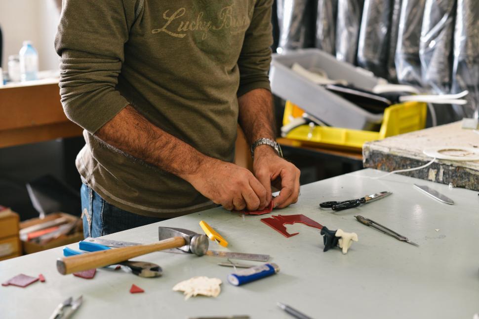 Free Image of Artist Working on Art Piece 