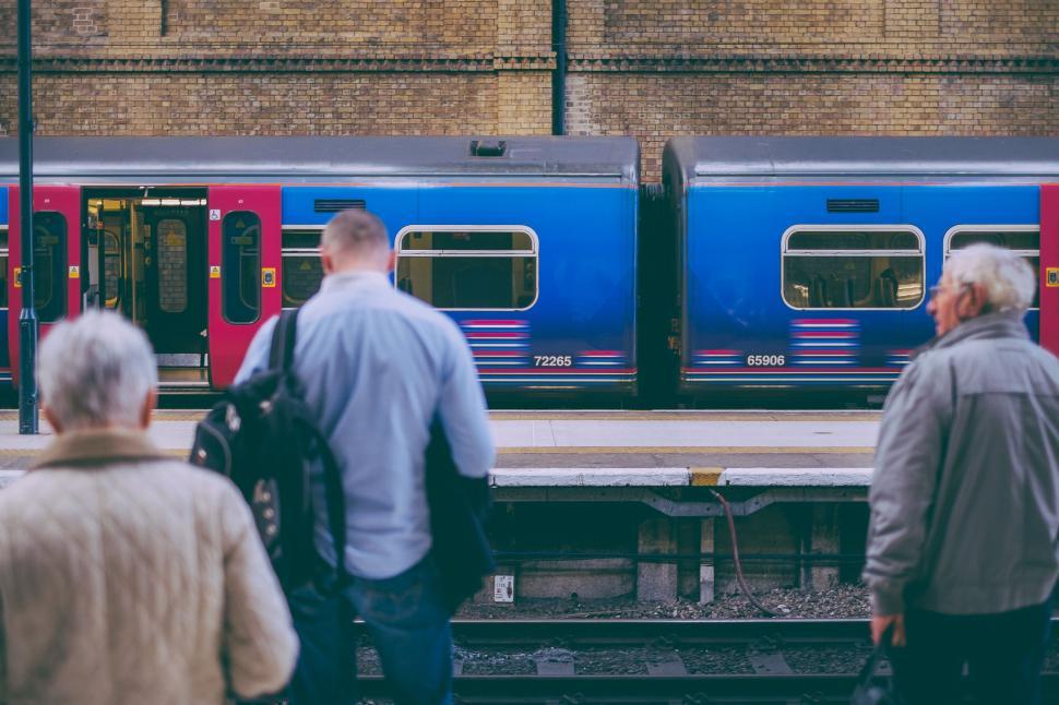 Free Image of Group of People Waiting for Train at Train Station 