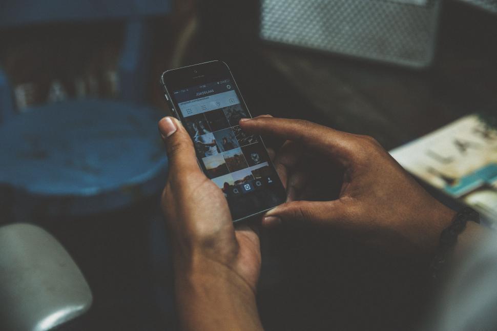 Free Image of Person Holding Cell Phone in Hand 