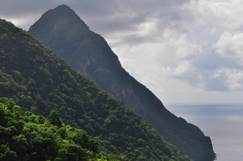 Free Image of Majestic Mountain Overlooking Body of Water 