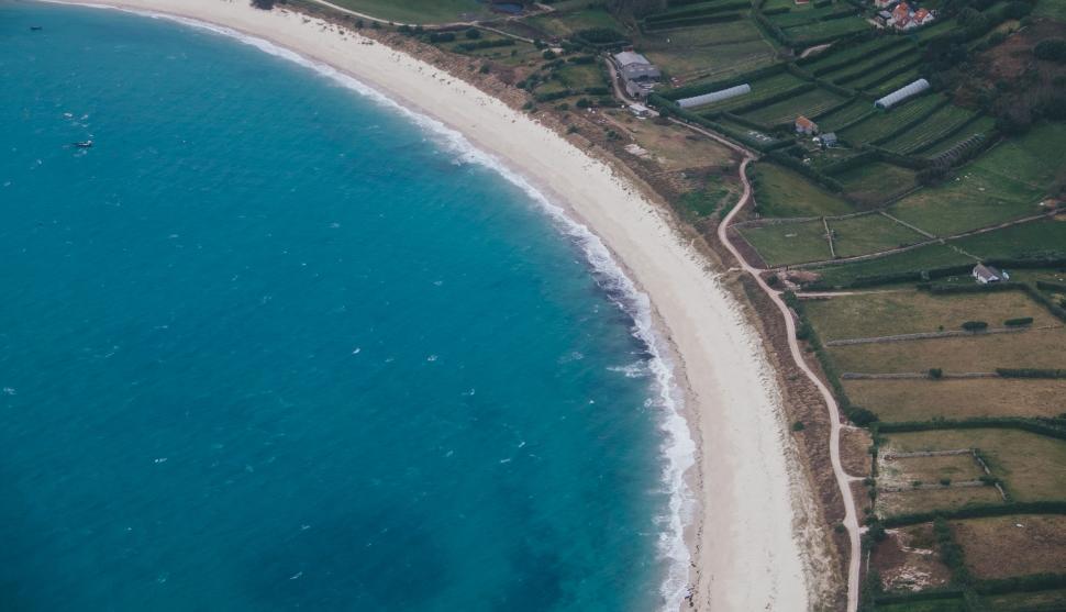Free Image of Aerial View of Beach and Water 