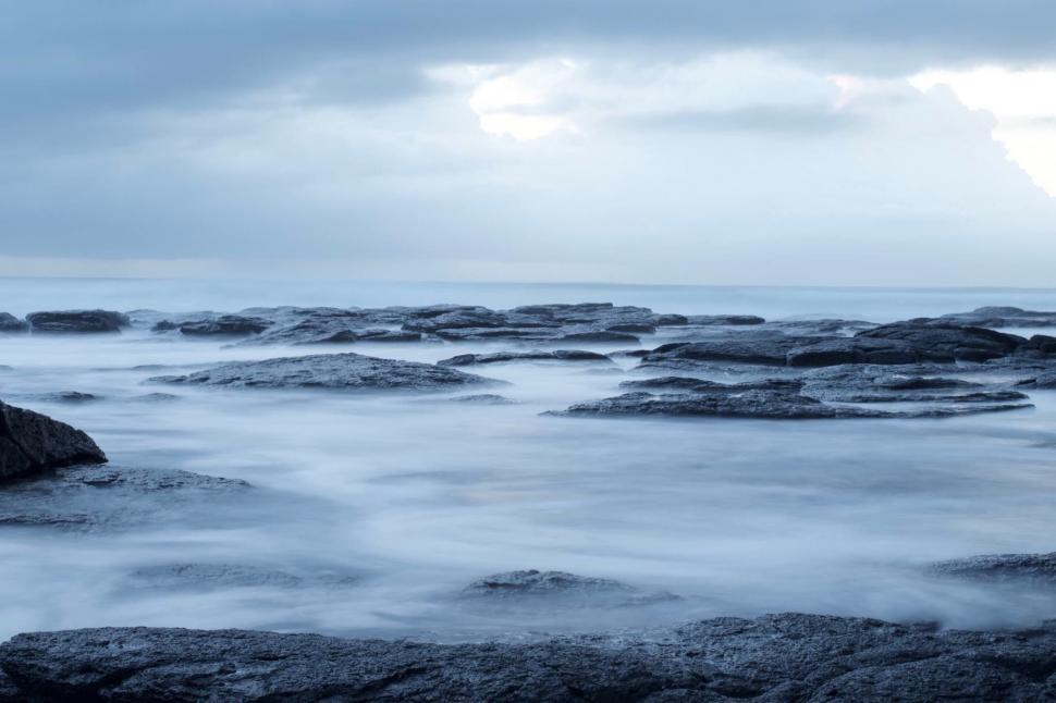 Free Image of Massive Lake Surrounded by Rocky Terrain 