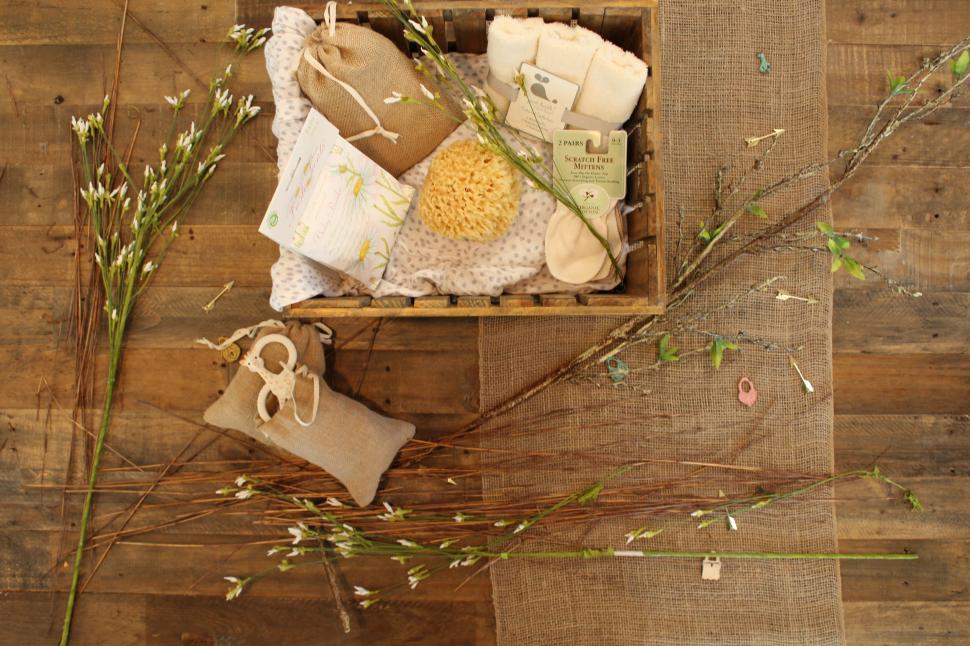 Free Image of Wooden Crate Filled With Various Items on Wooden Floor 