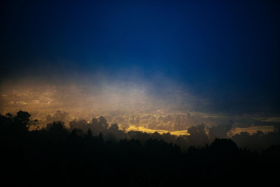 Free Image of Dark Sky With Clouds and Trees 