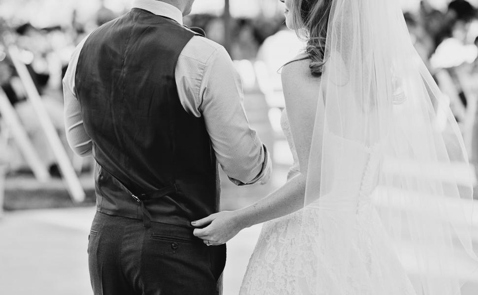 Free Image of Bride and Groom Posing Together 